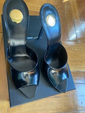 Saint Laurent Black Patent Leather Peep-Toe Stilettos with Gold Medallion